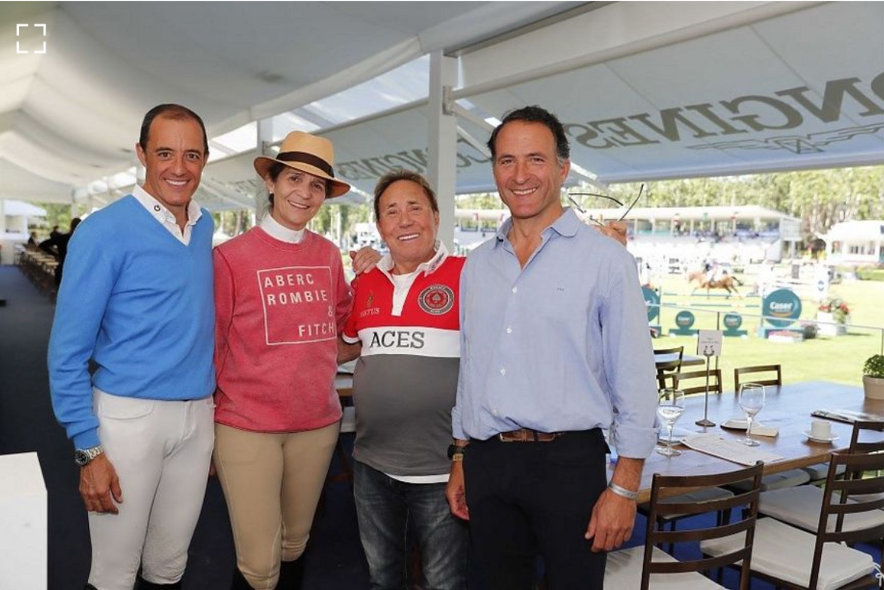 Michele Tecchia at a horserace, 2017 (second on the right)